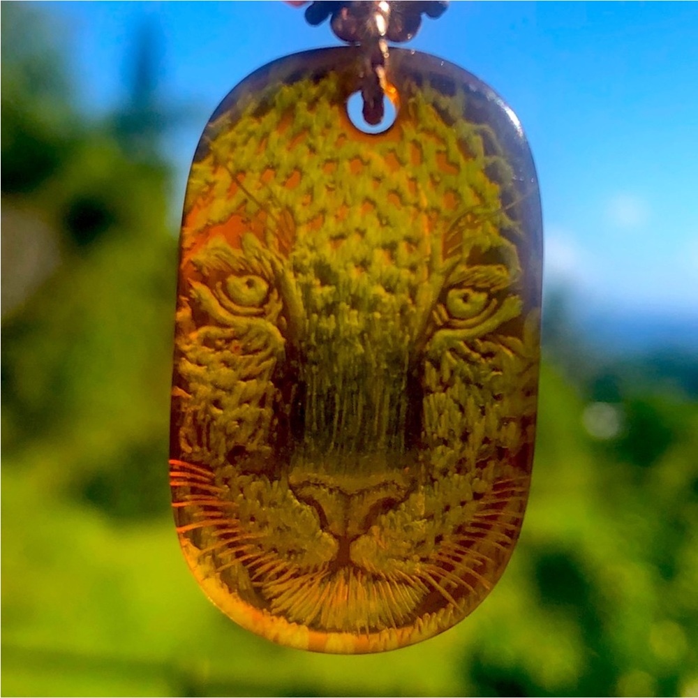 Beautiful Baltic Amber Beaded  Necklace with a Lionesses face Etched into Amber